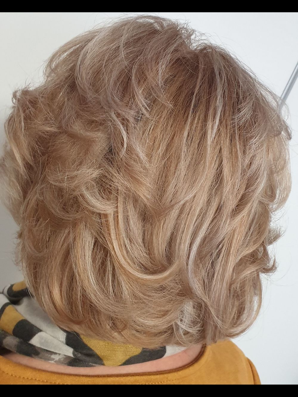 Lichtblond golvend haar