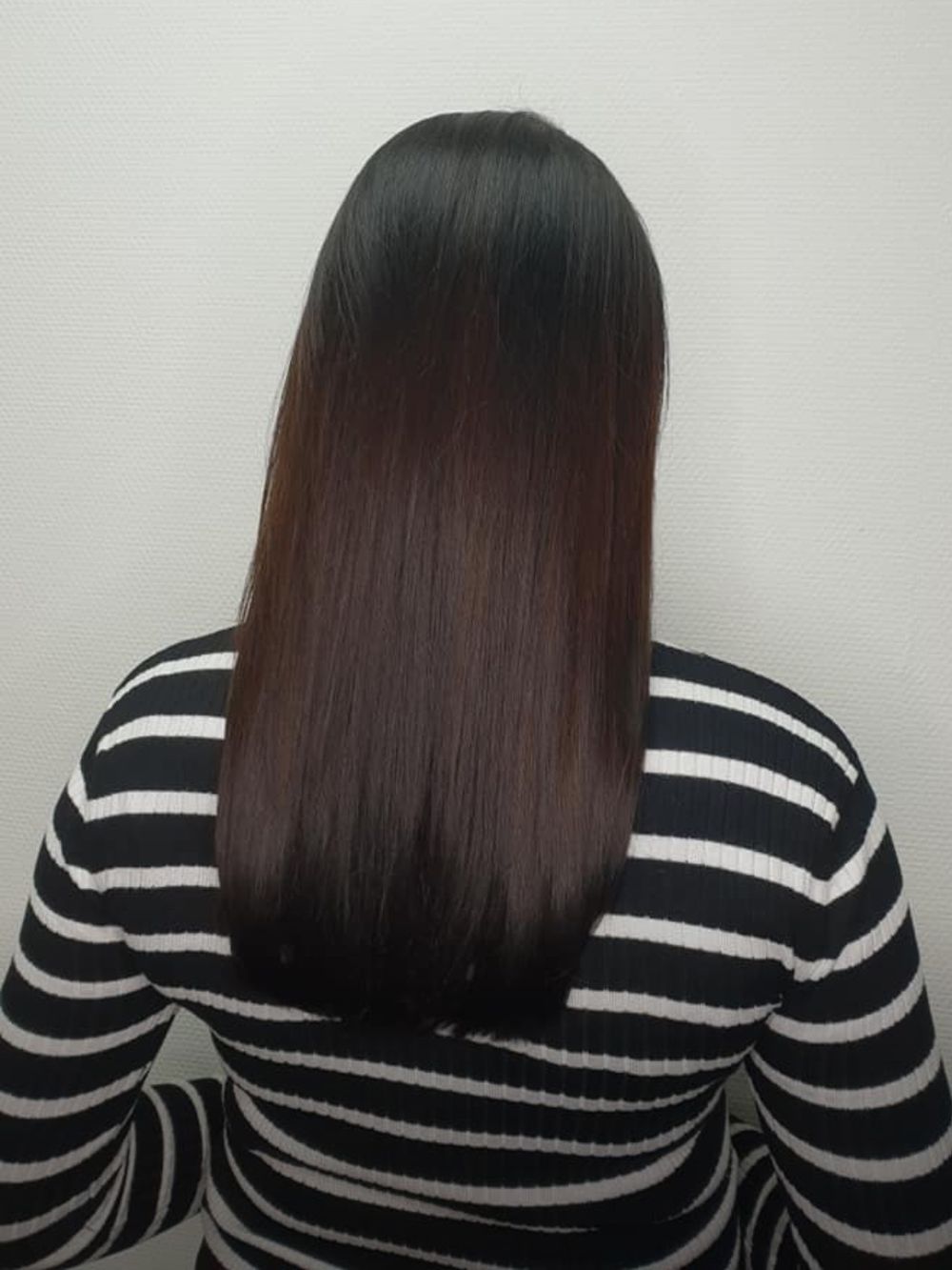 Donkergekleurd lang haar